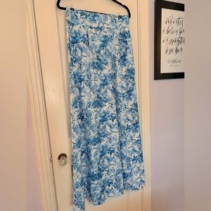 Two piece wide, legged outfit.